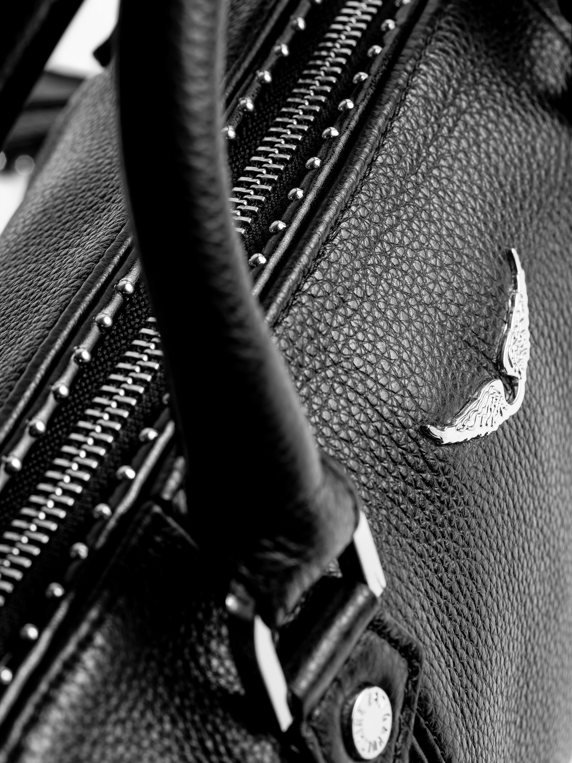 XS Sunny Studs Bag - Iconic Sunny XS bag in grained leather adorned with silver studs.